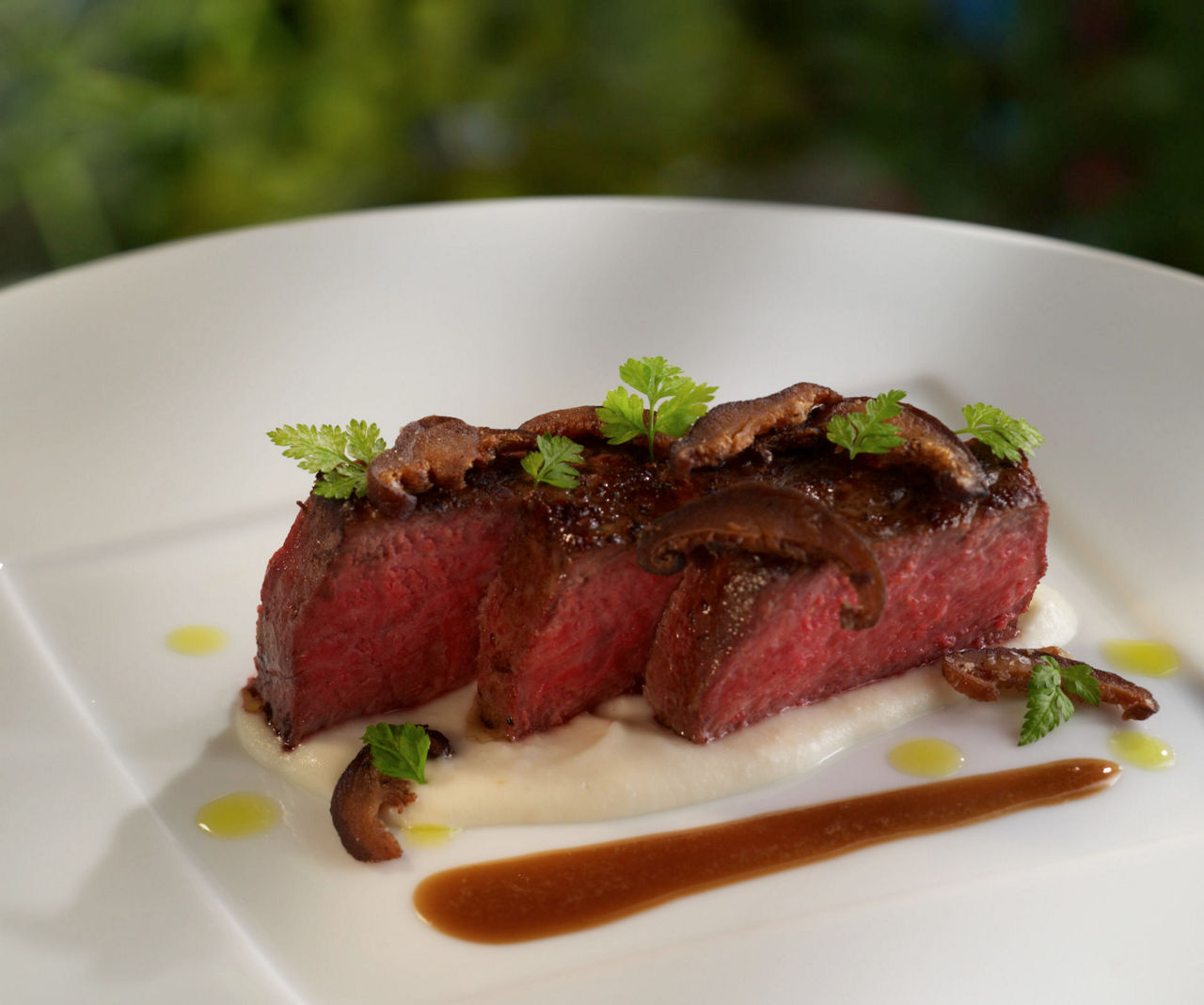 Kobe beef, steak with celery root cream & demi-glace. Best vacation cruise line fine dining cuisine, 150 Central Park.
