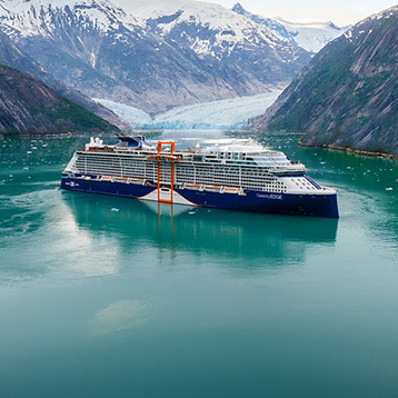Celebrity Cruises ship sailing through an Alaskan fjord