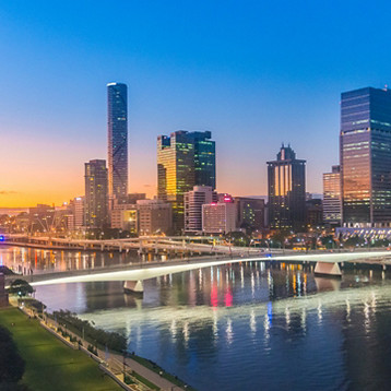Brisbane skyline reflected on the Brisbane River at dusk