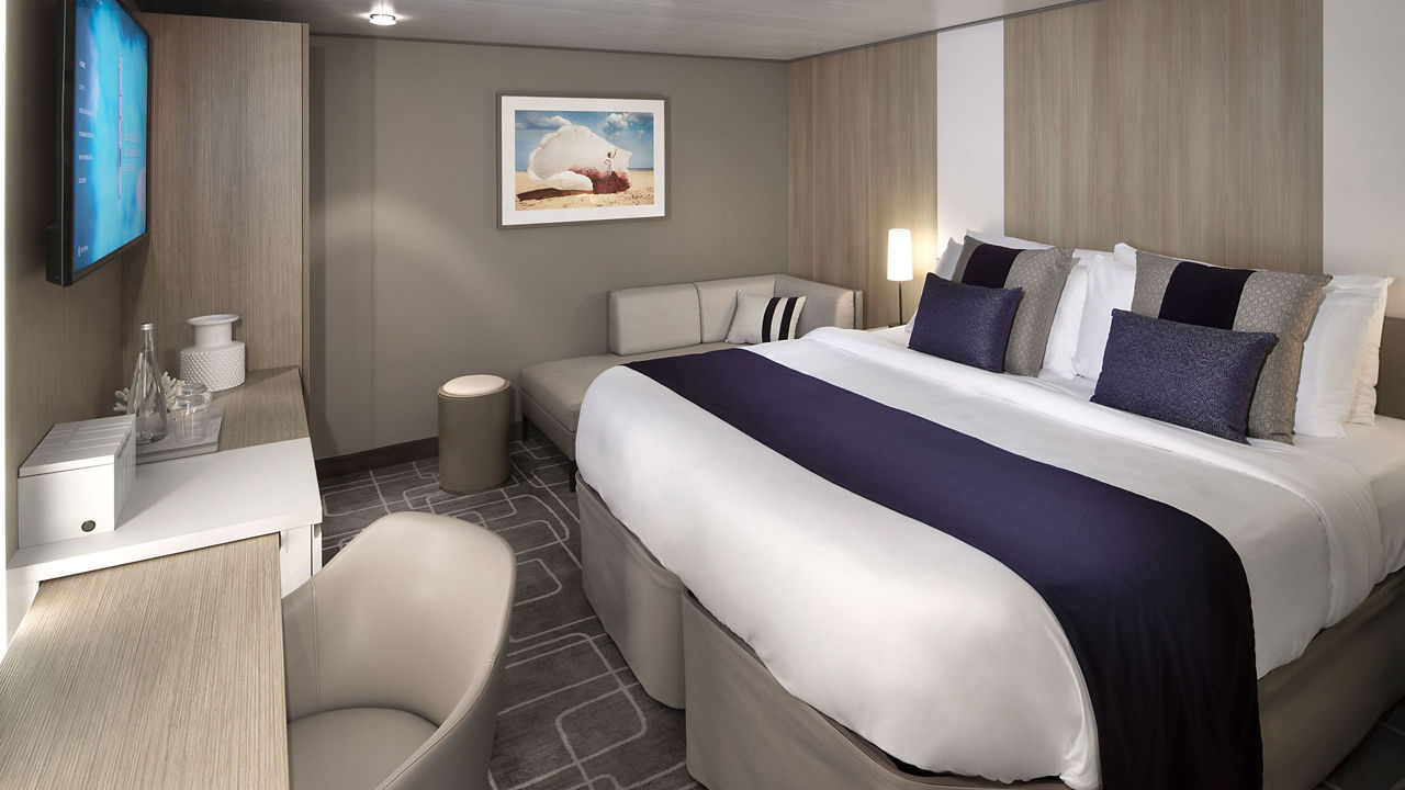 https://assets.dm.rccl.com/is/image/RoyalCaribbeanCruises/celebrity/new-images/celebrity-edge-project/staterooms/edge-18-inside-stateroom-r-2560x1440.jpg