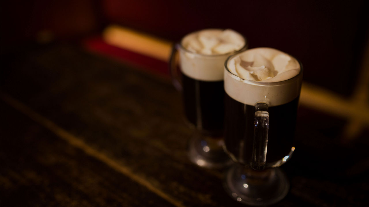 Pints of beer on top of a table in a brewery in Dublin