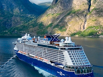 Celebrity ship sailing through Europe countryside