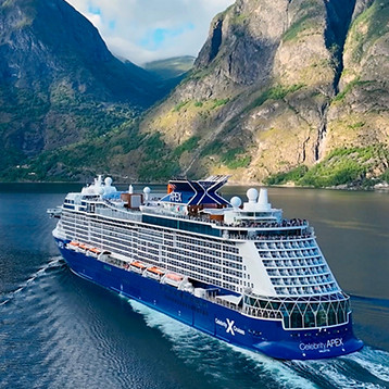 Celebrity ship sailing through Europe countryside