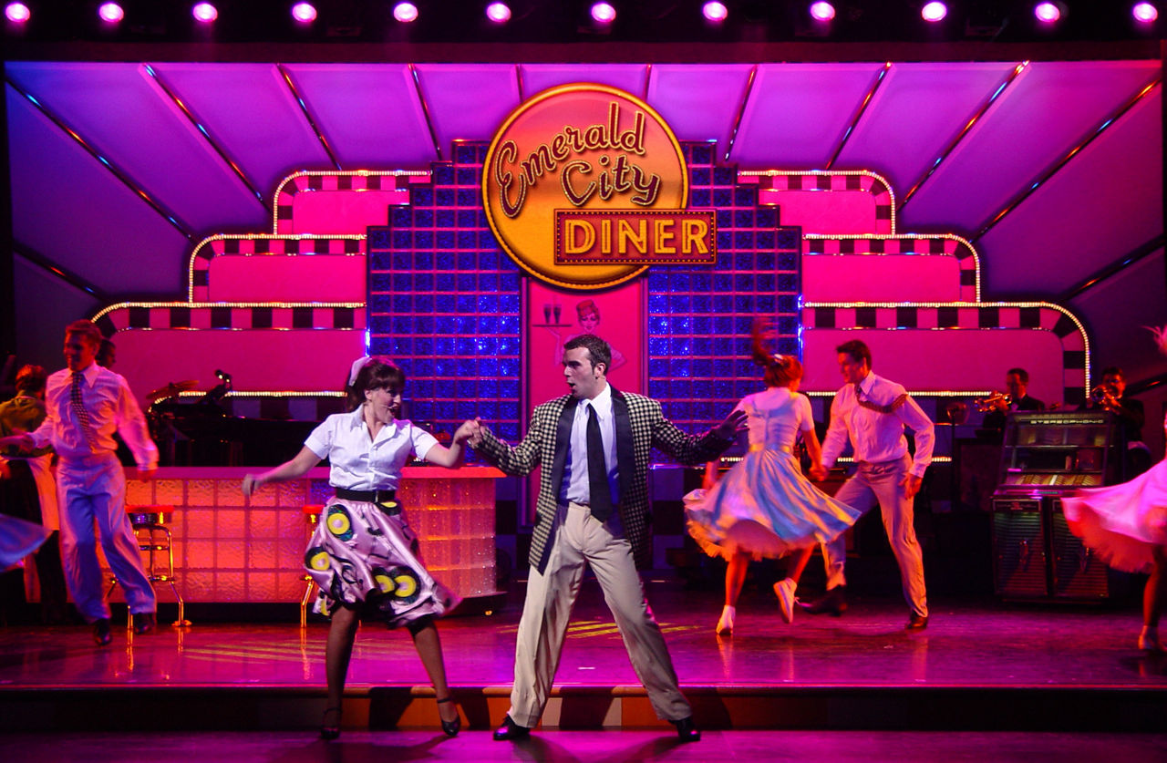Performers dancing during Piano Man Cruise Show on Radiance of the Seas