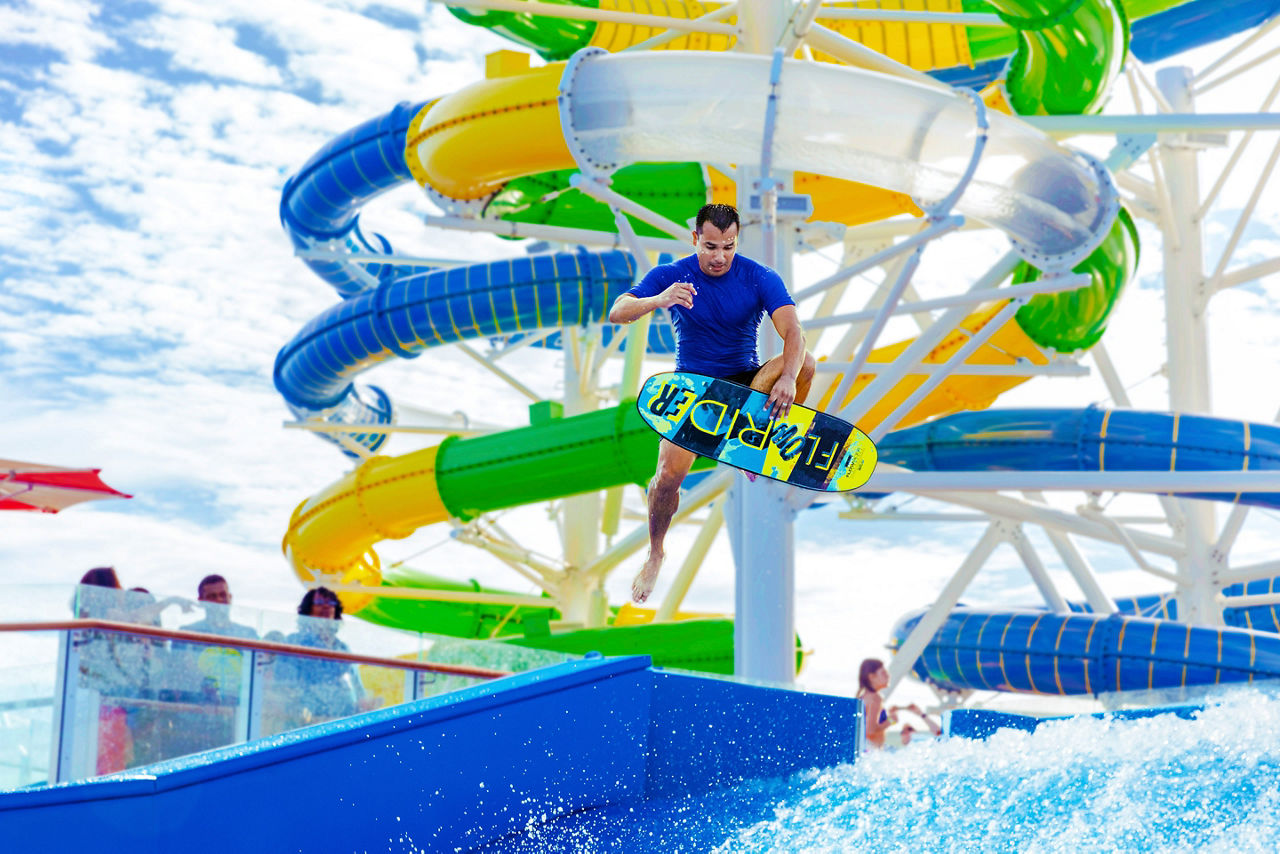 Man Surfing and Doing Tricks at Flowrider