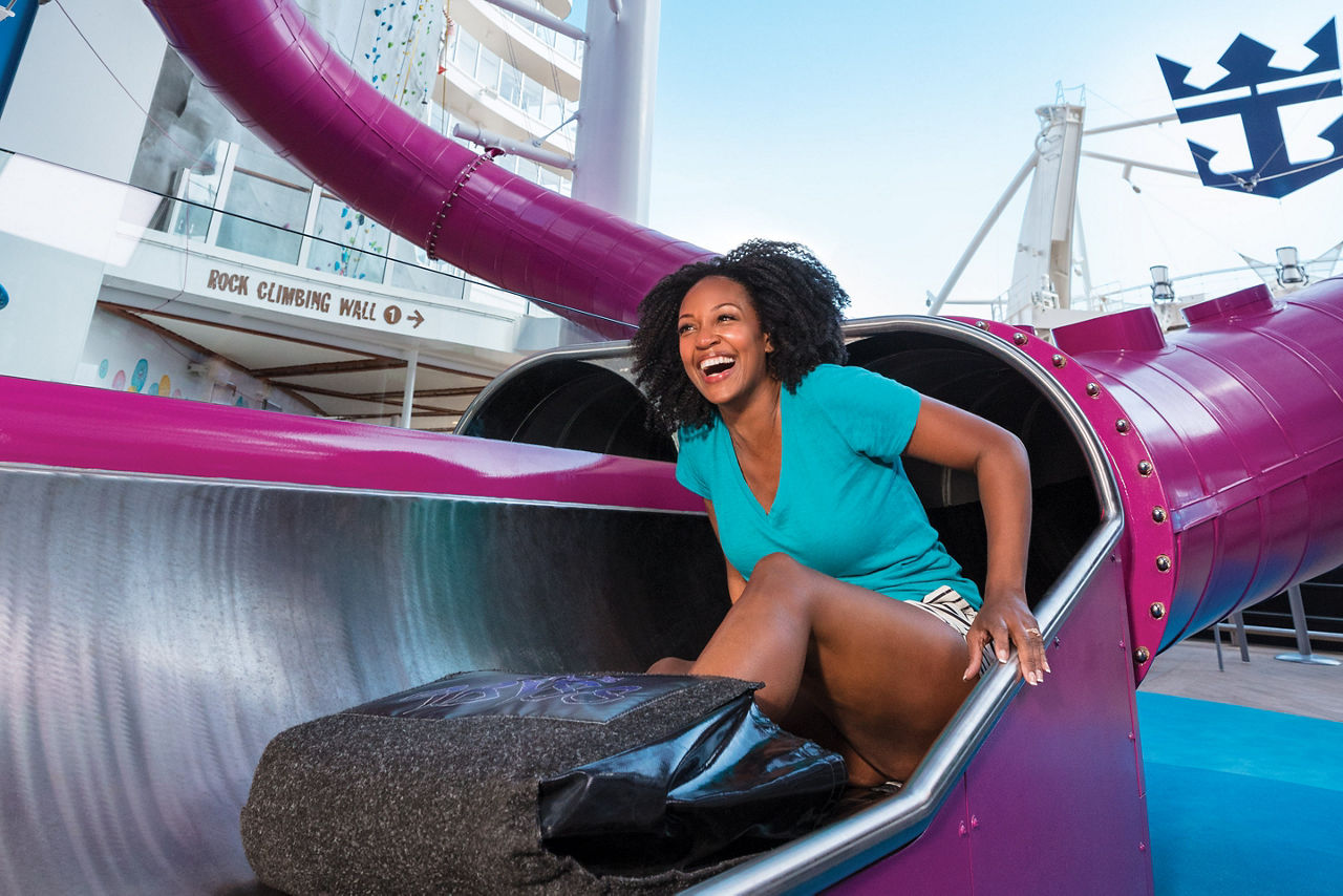 Woman Enjoying Sliding Down Ultimate Abyss