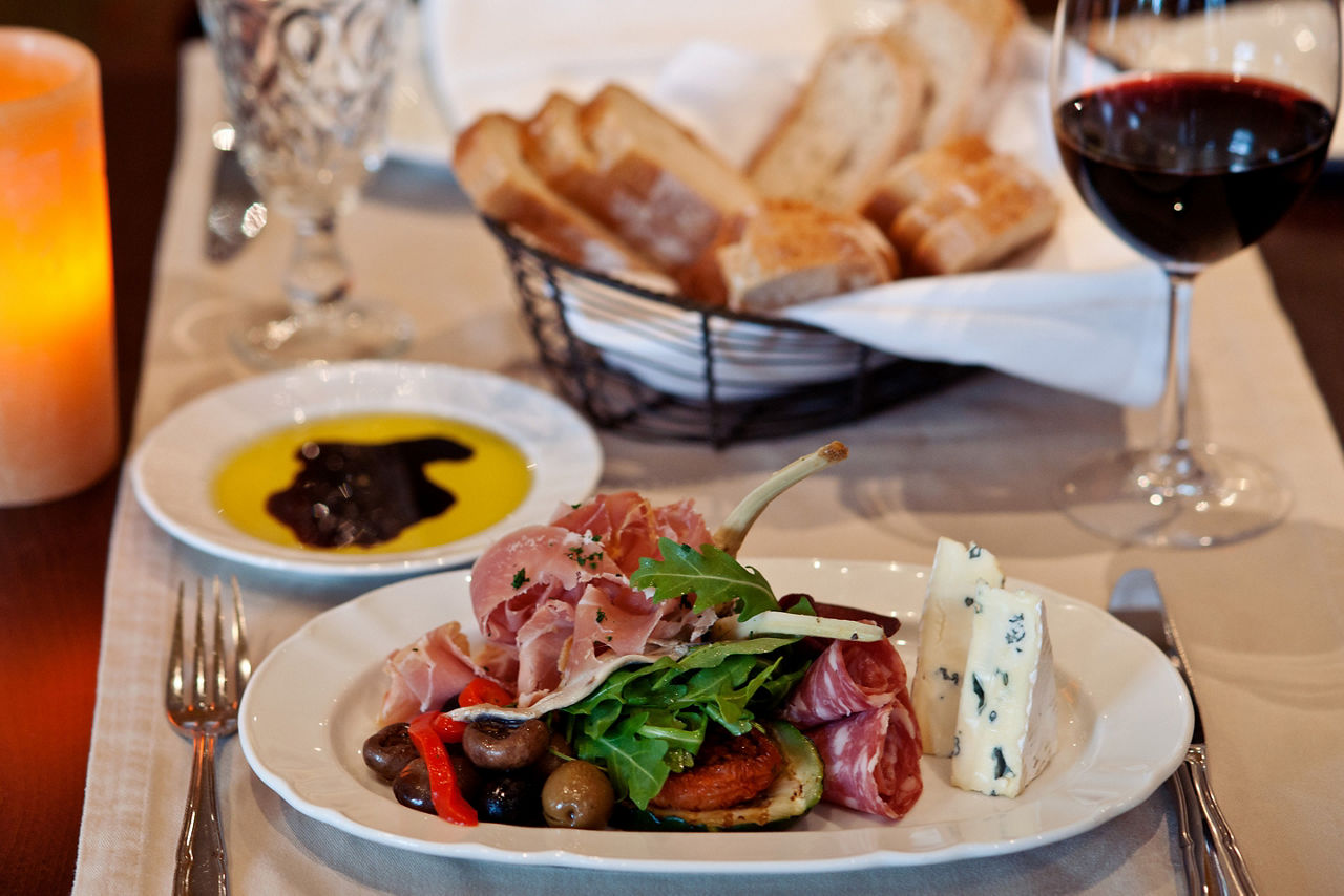 Italian salami, prosciutto, roasted peppers, olives & Gambonzola cheese. Best cruise dining at Giovanni's Table restaurant.