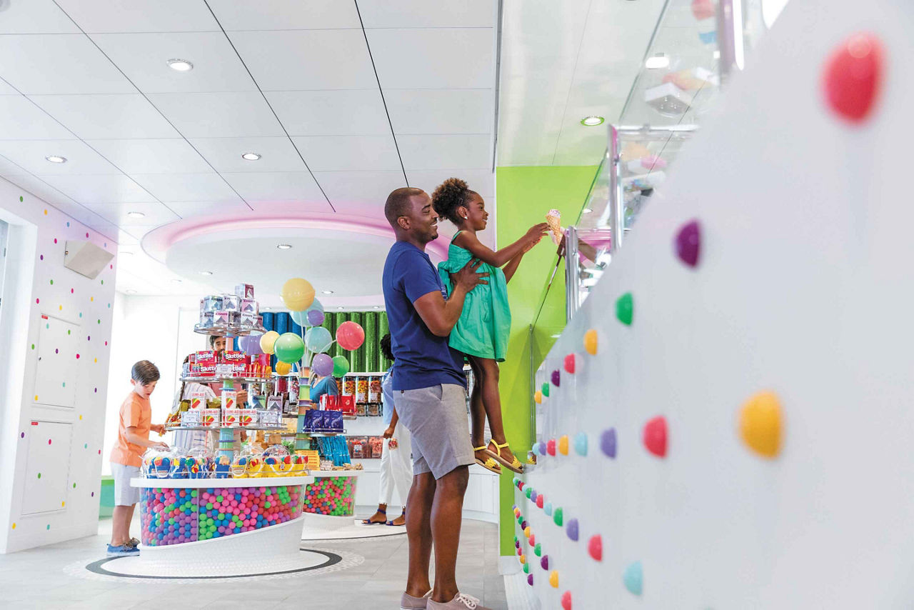 Girl getting her ice cream at Sugar Beach Candy Store