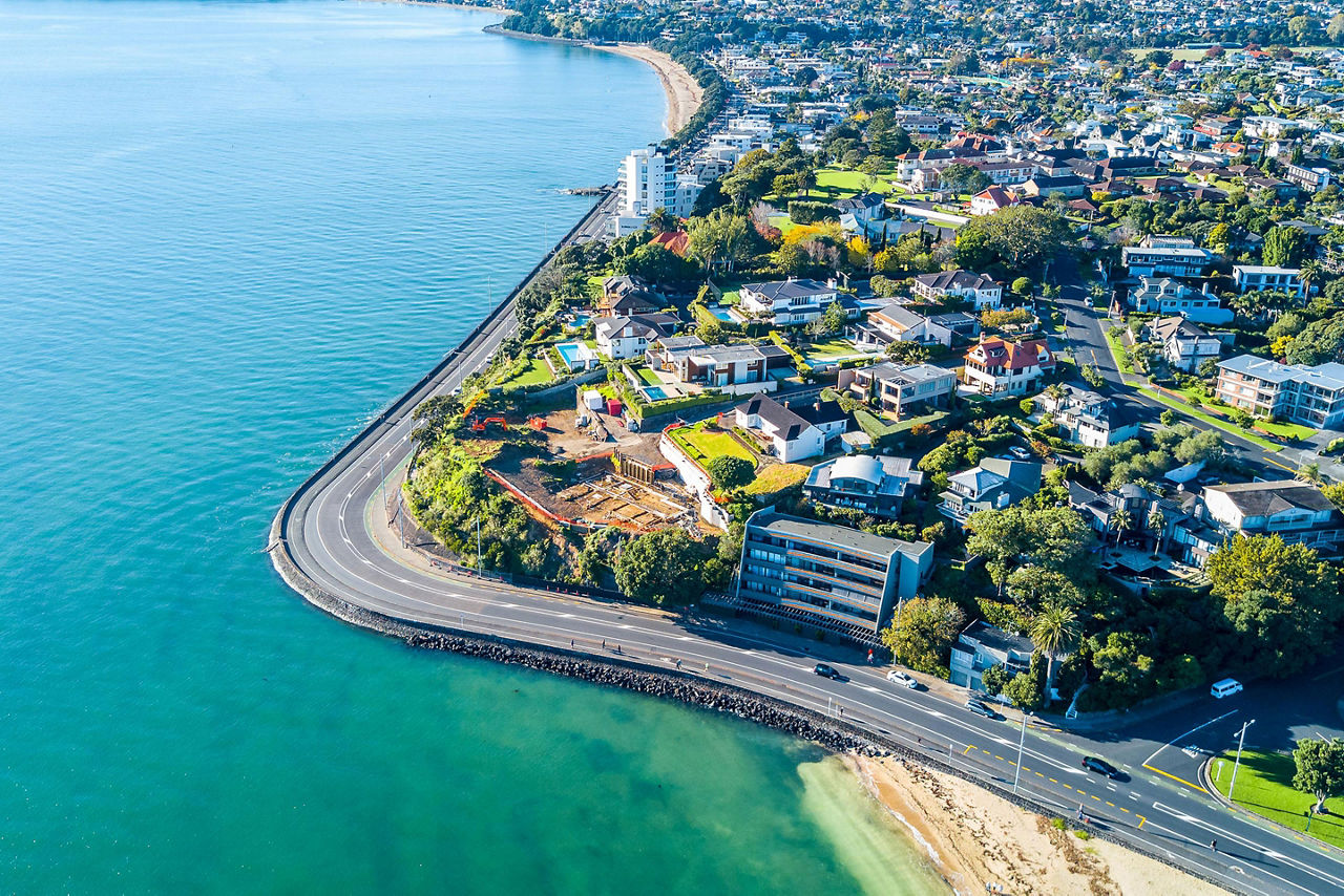 Aerial view of a coastal road in Auckland, New Zealand