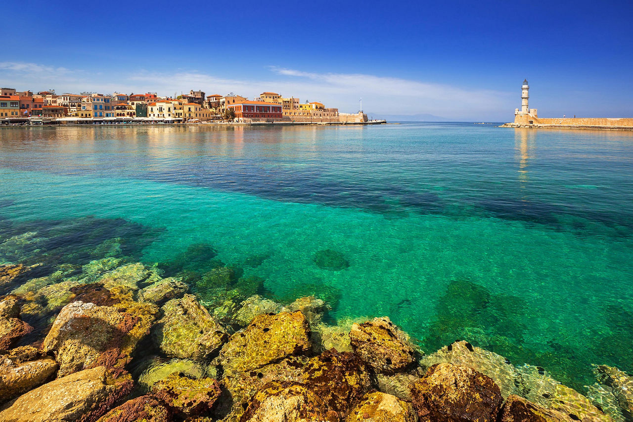 A lighthouse at the entrance to the old port in Chania, Crete