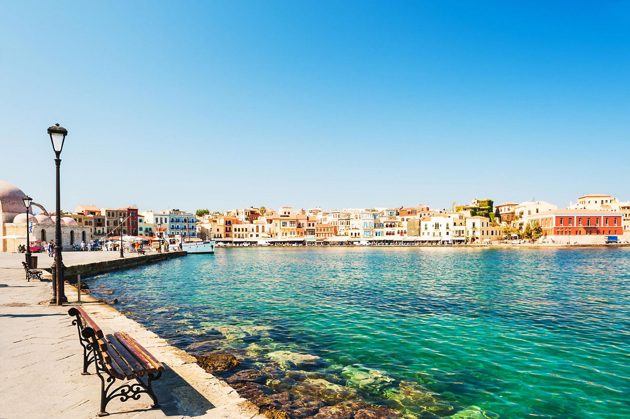 A panoramic view of the buildings lining the coast of Chania, Crete