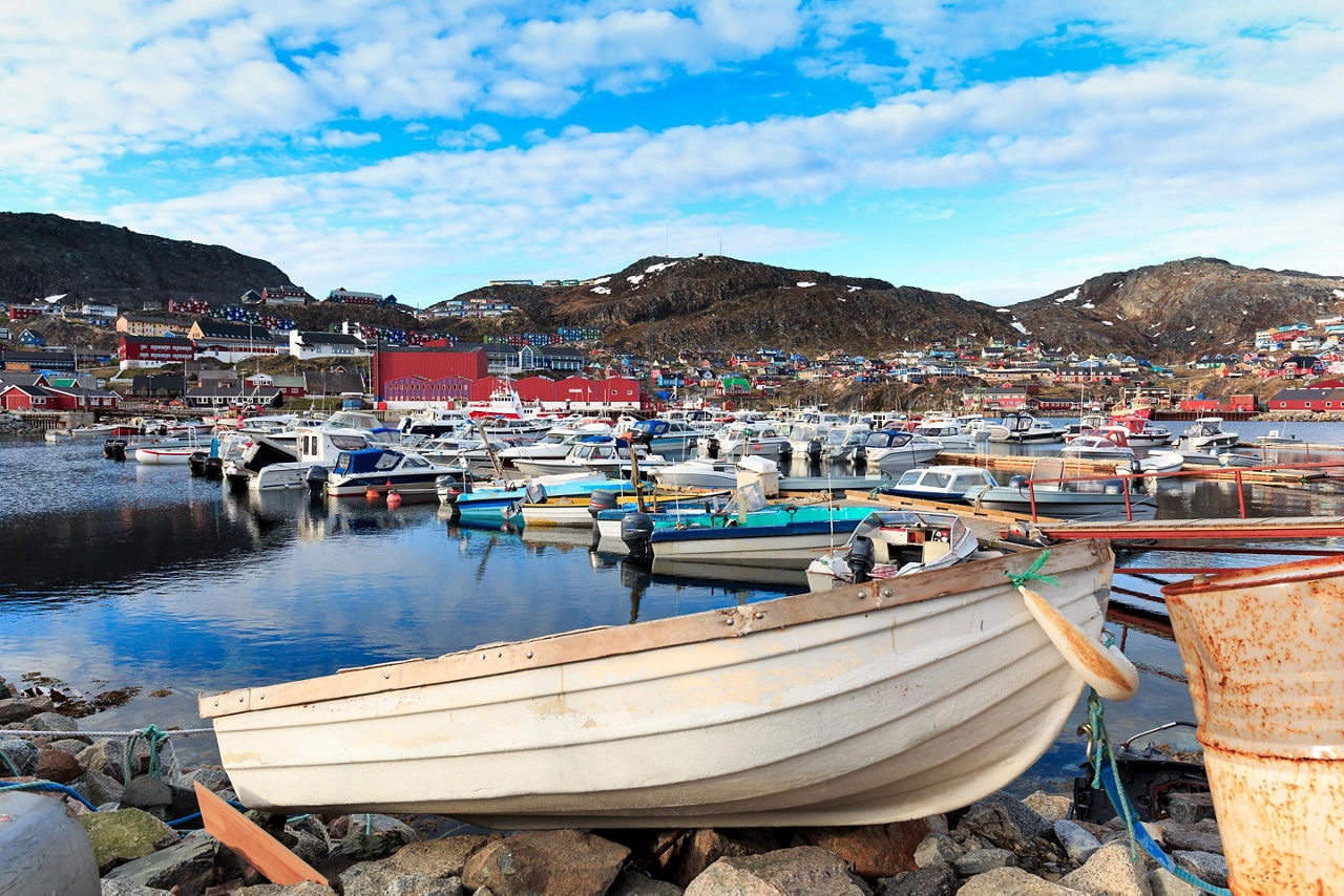 A moored boat at a marina in Qaqortoq, Greenland