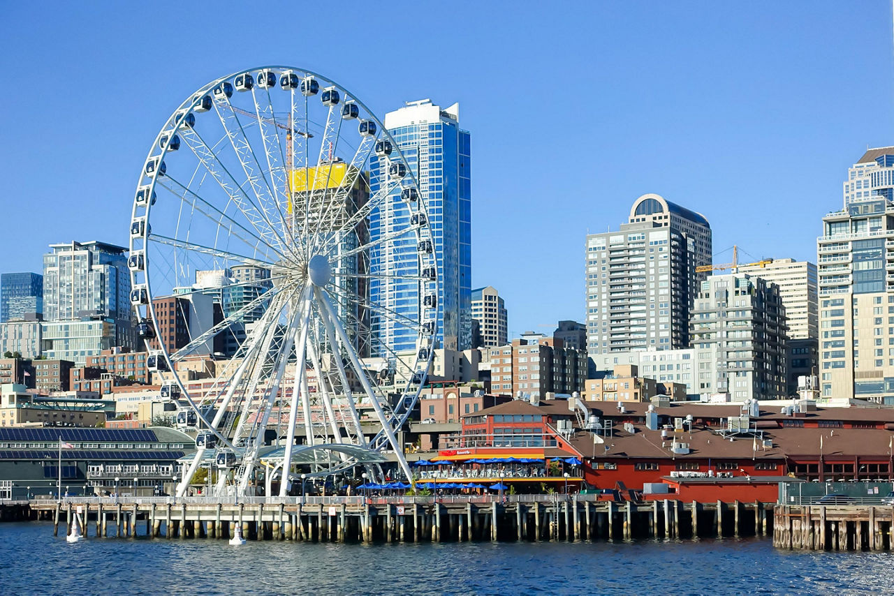 Seattle Great Wheel and skyline at the pier in Seattle, Washington