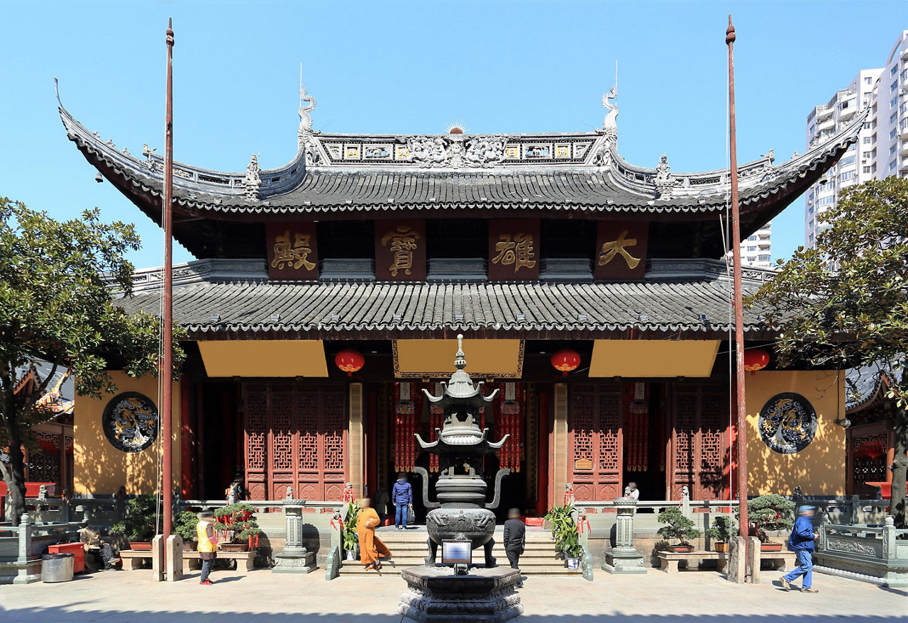 The Jade Buddha Temple with a fountain on a sunny day in Shanghai, China