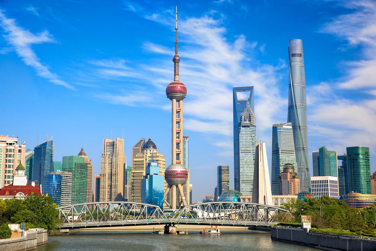 View of historical Waibaidu bridge and skyline of Shanghai, China