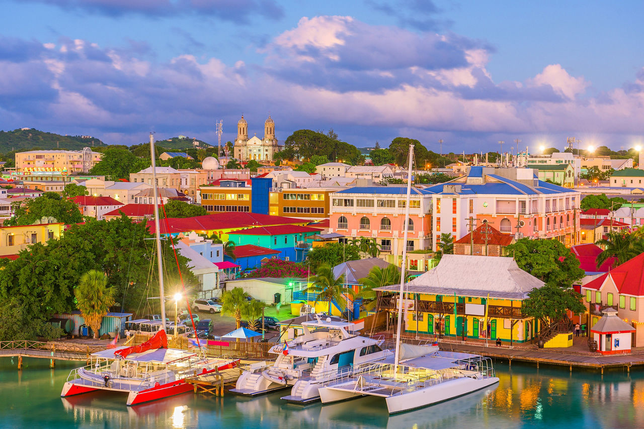 Catamarans Docked with Baroque Cathedral in the Distance, St. John's, Antigua