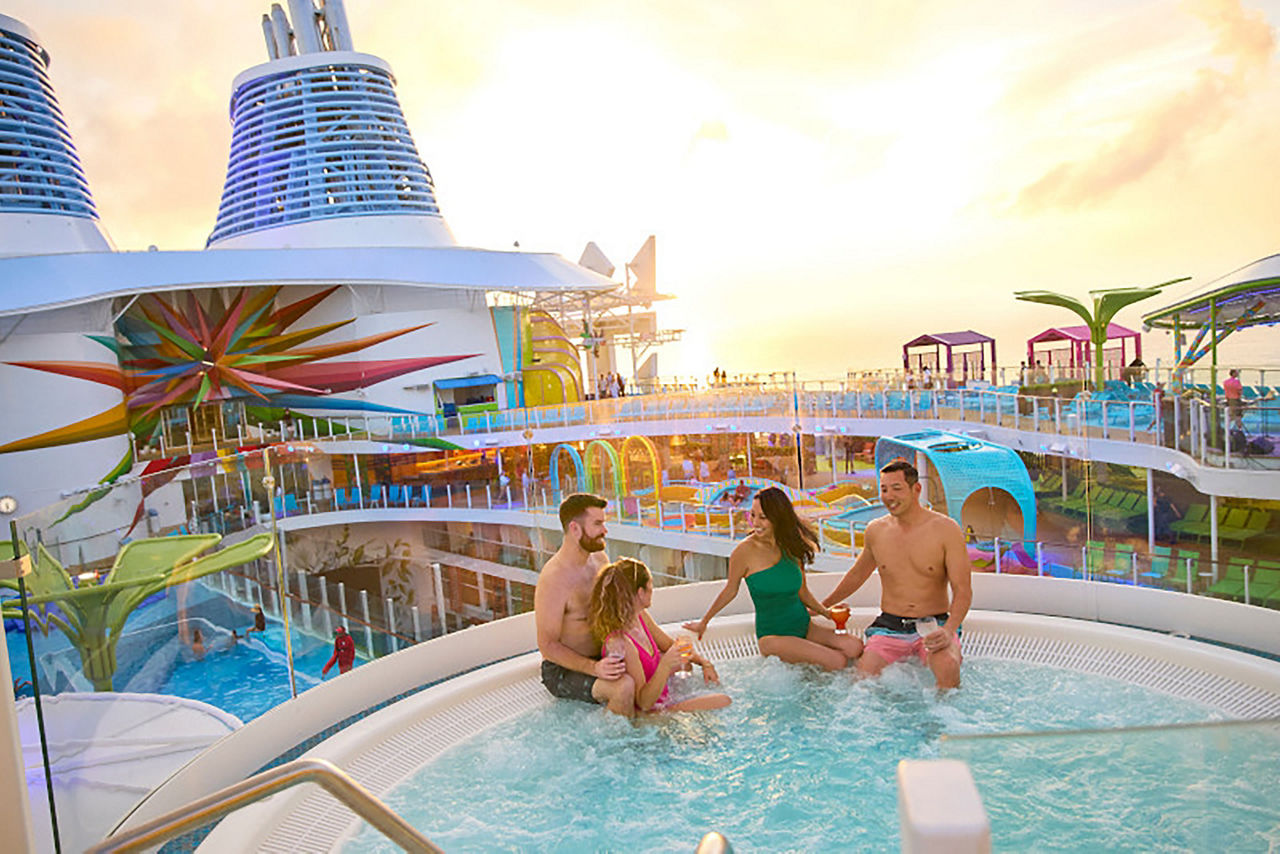 icon of the seas chill island hot tub sunset hour with friends