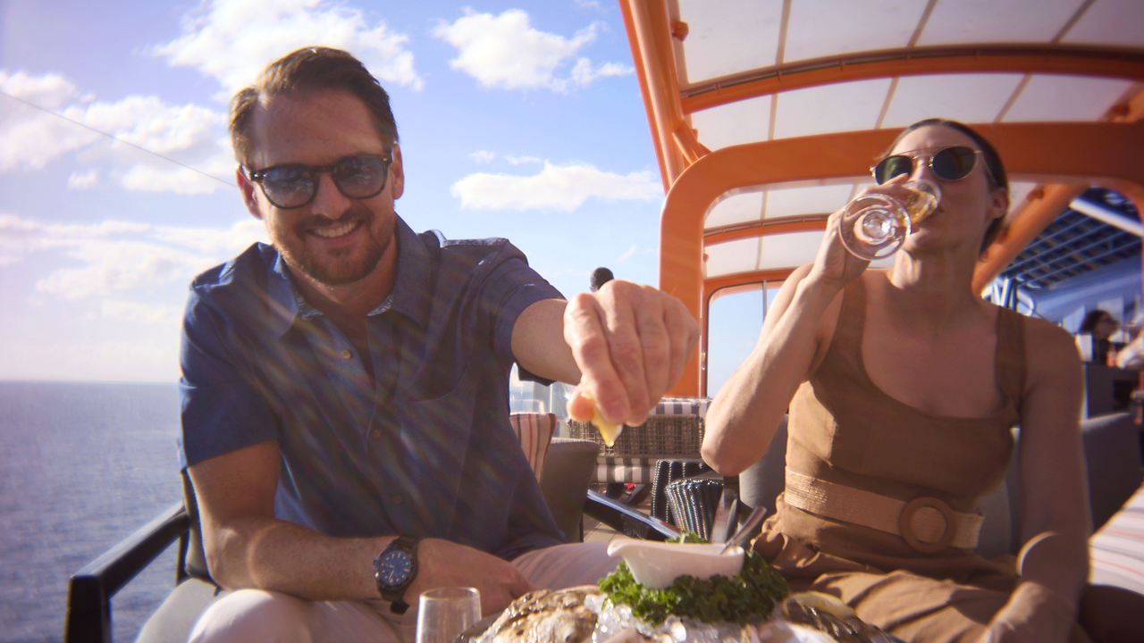 couple on magic carpet eating and drinking tev 2560x1440