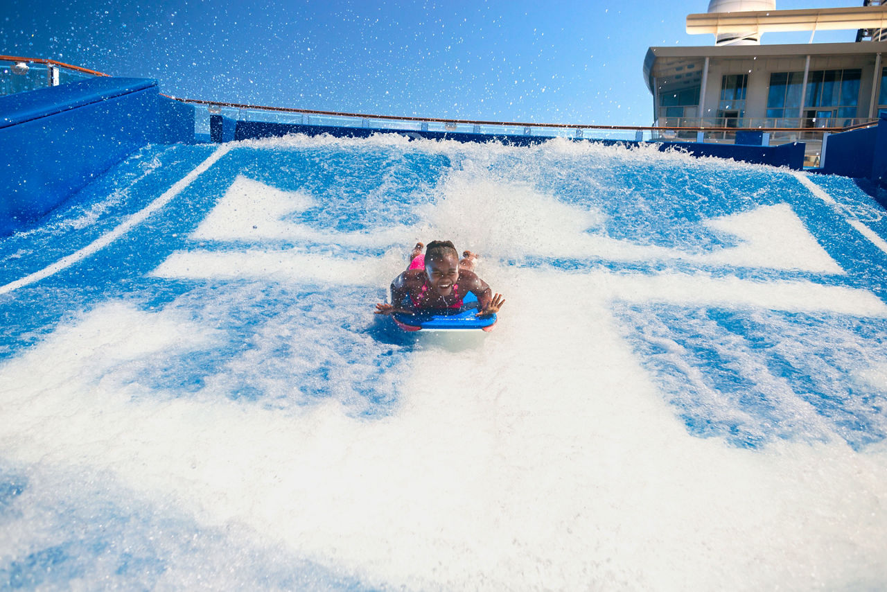 Young Girl Body Surfing on Flowrider 