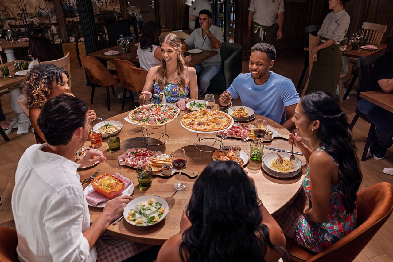Friends dining at Giovanni's Italian Kitchen and Wine Bar, fine dining, Italian cuisine, dinner, pizza