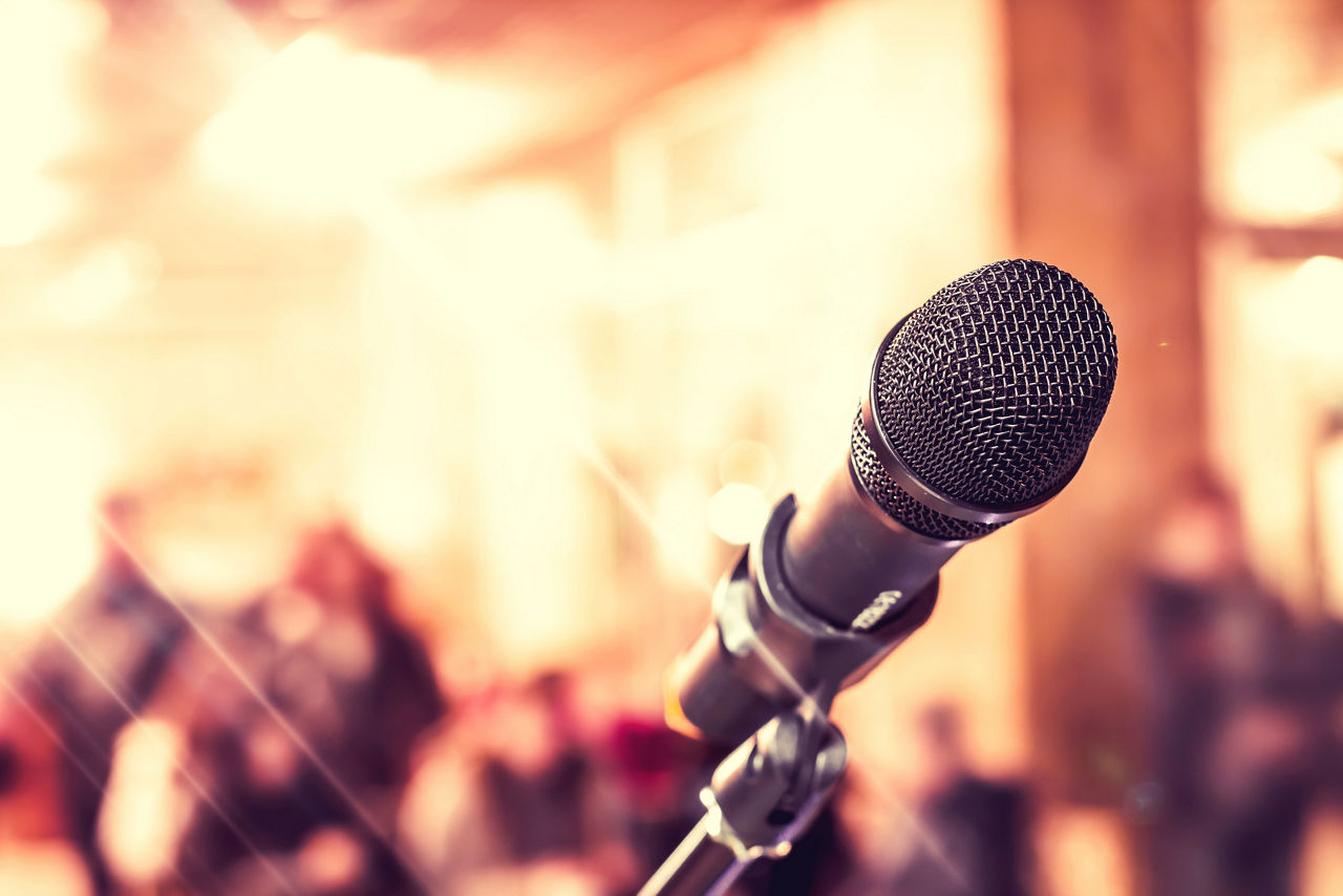 guest-entertainer-microphone-stage