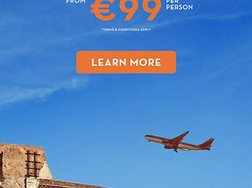 Airplane flying over The Colosseum 