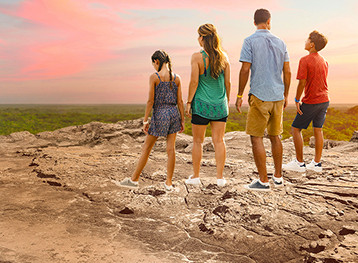 Family looking at the sunset views in Mexico