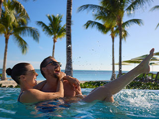 new nav couple perfect day coco cay beach club infinity pool