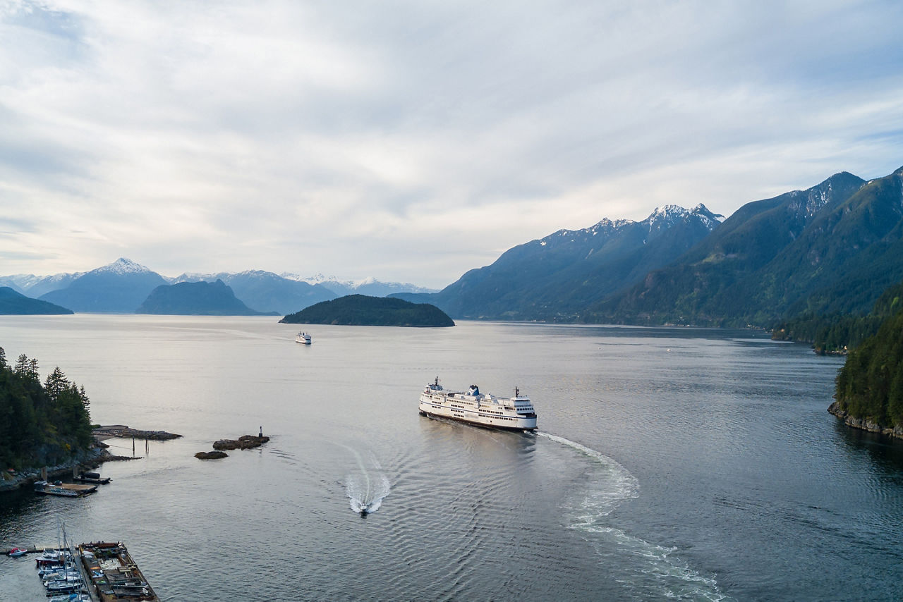 Aerial Panoramic view of Horseshoe Bay with Ferry leaving the terminal.