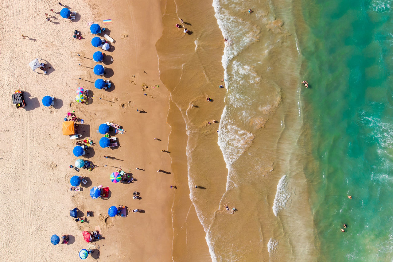 Aerial top view of  busy beach at South Padre Island, Texas