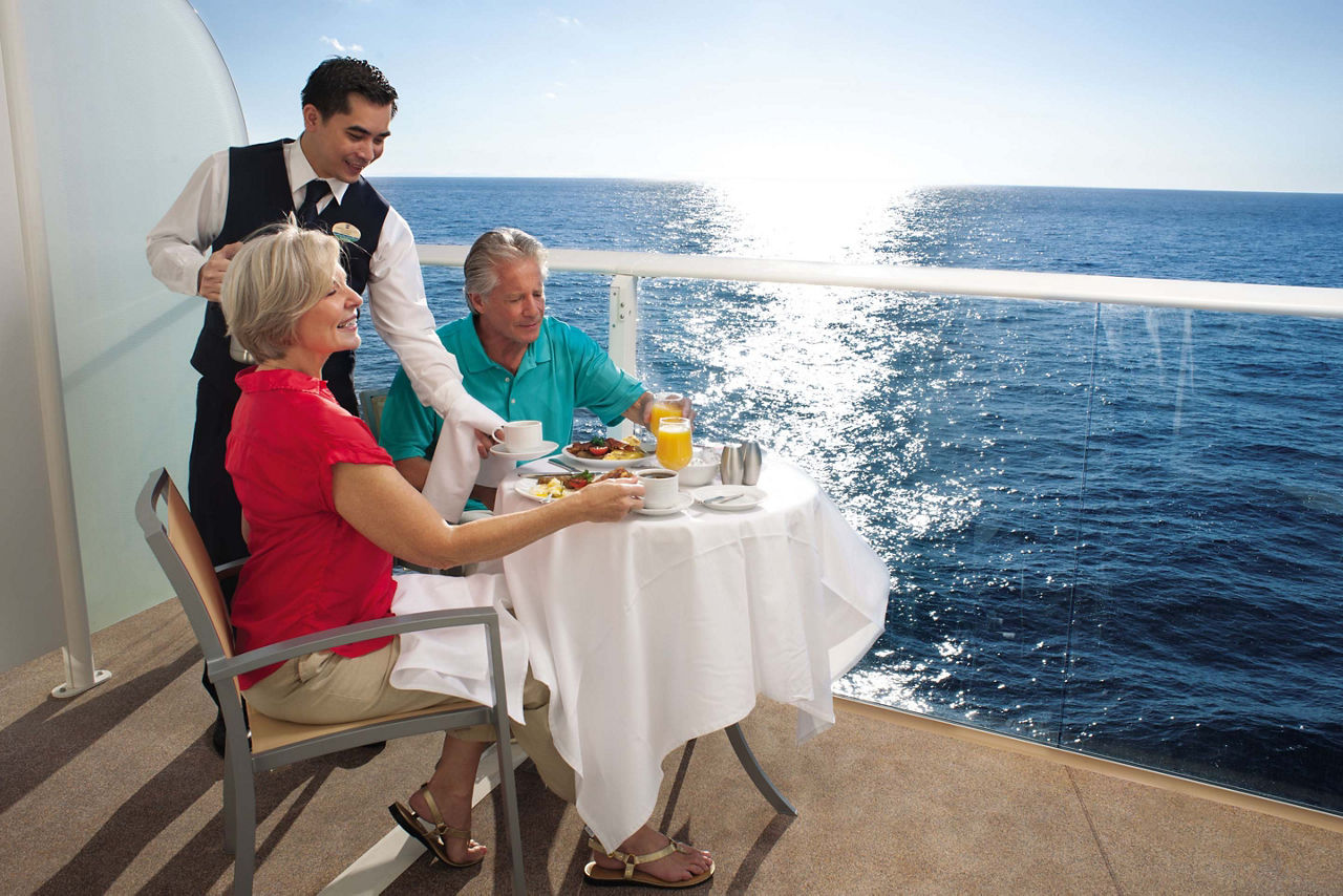 Couple on a Cruise Balcony Enjoying Room Service