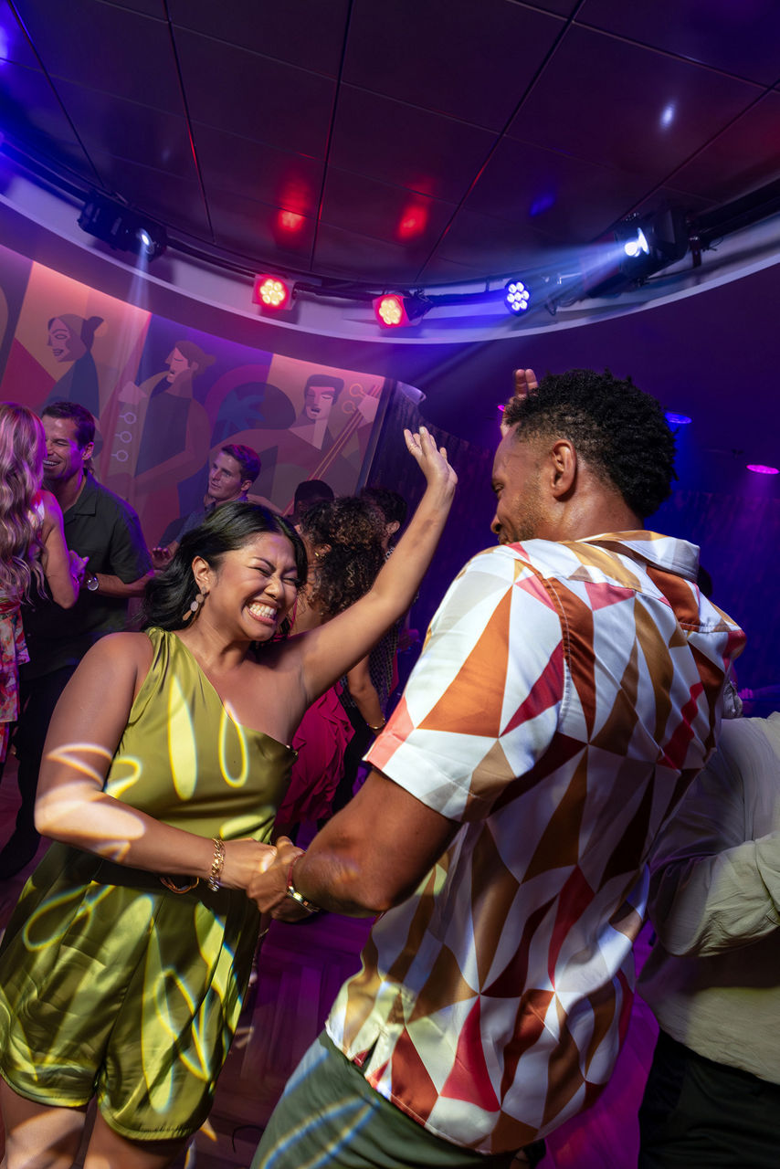 Couple dancing at Boleros onboard Utopia of the Seas