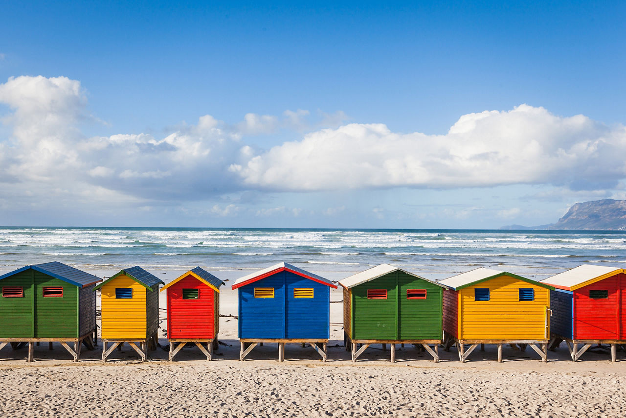 brightly colored huts in Muizenberg beach
