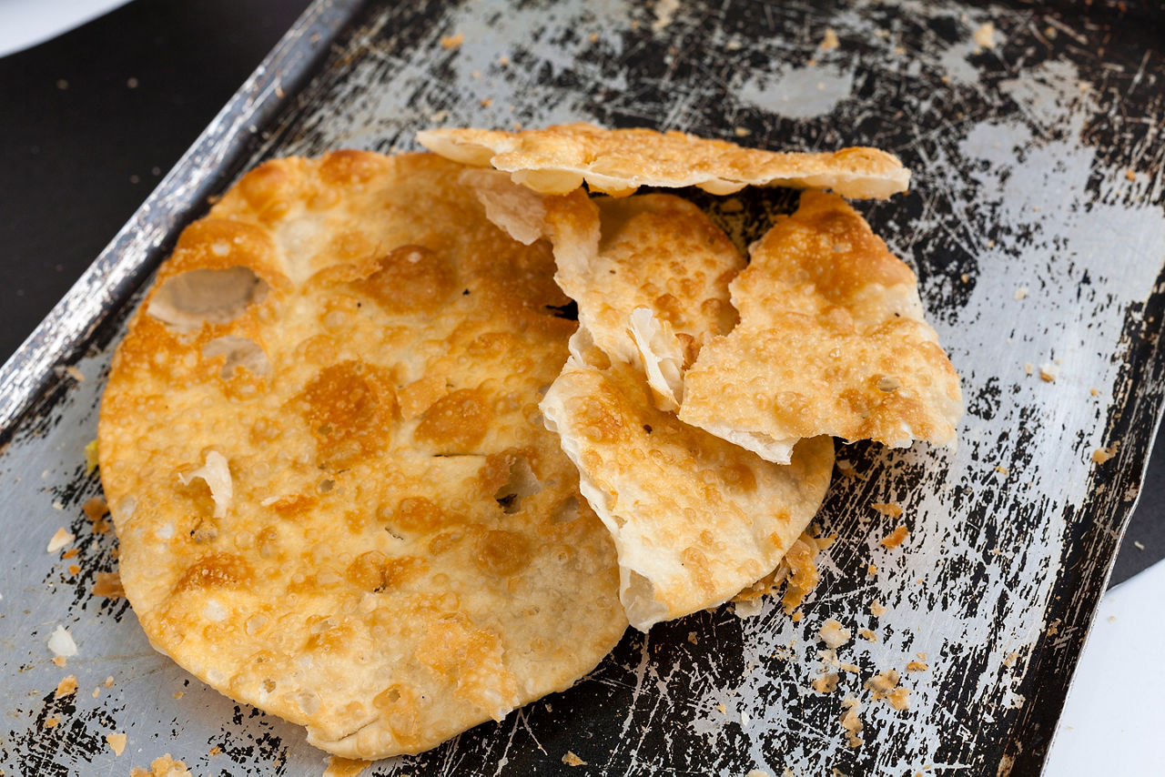 Close up of fried flatbread Yaniqueque