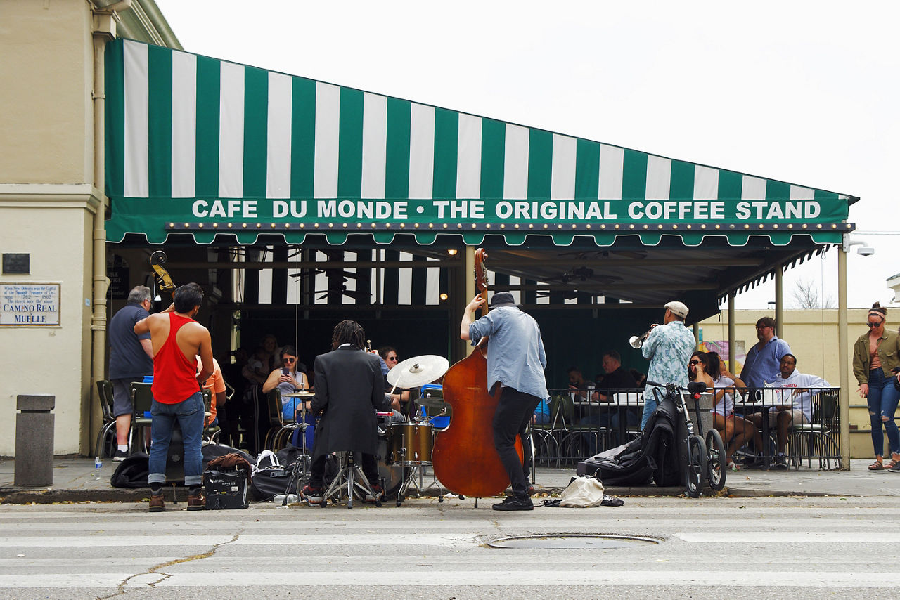 The musicians play for tips outside of the world famous Cafe Du Monde in New Orleans  Louisiana 