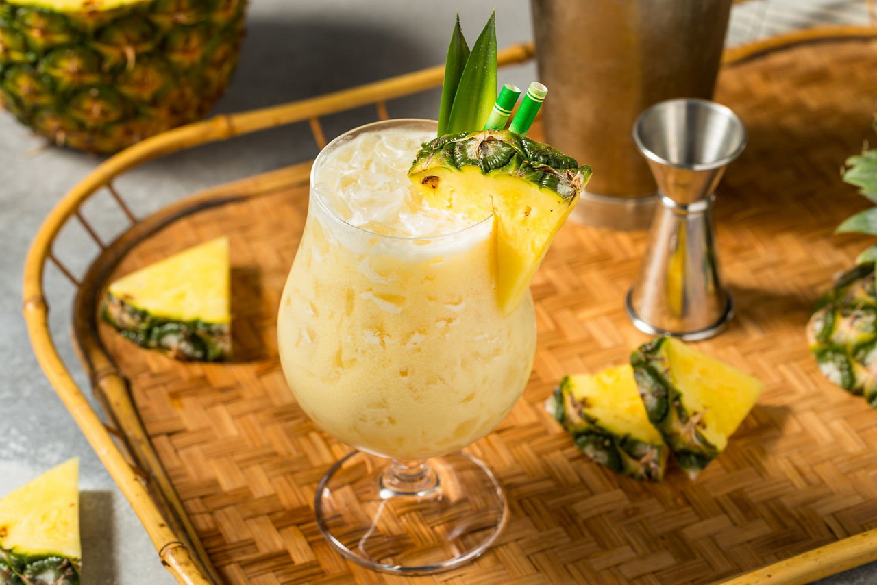 Boozy Cold Pineapple Painkiller Cocktail with Coconut and Rum