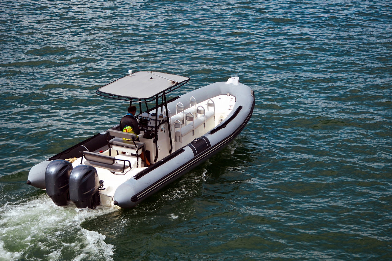 Pontoon motor boat cruising on Biscayne Bay off of Miami Beach,Florida