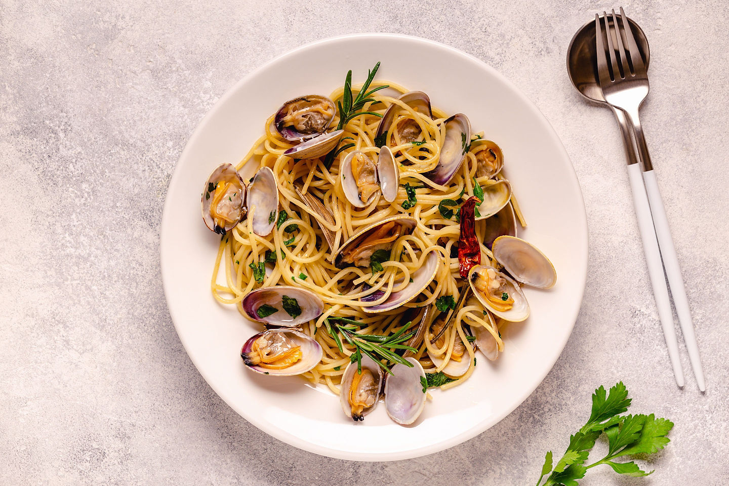 Spaghetti alle vongole showcases fresh clams, garlic, olive oil, and white wine. - Amalfi Coast, Italy
