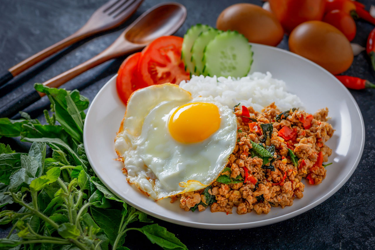 Thai Food Stir Fried Pork with Basil Leaves Popular food in Thailand.