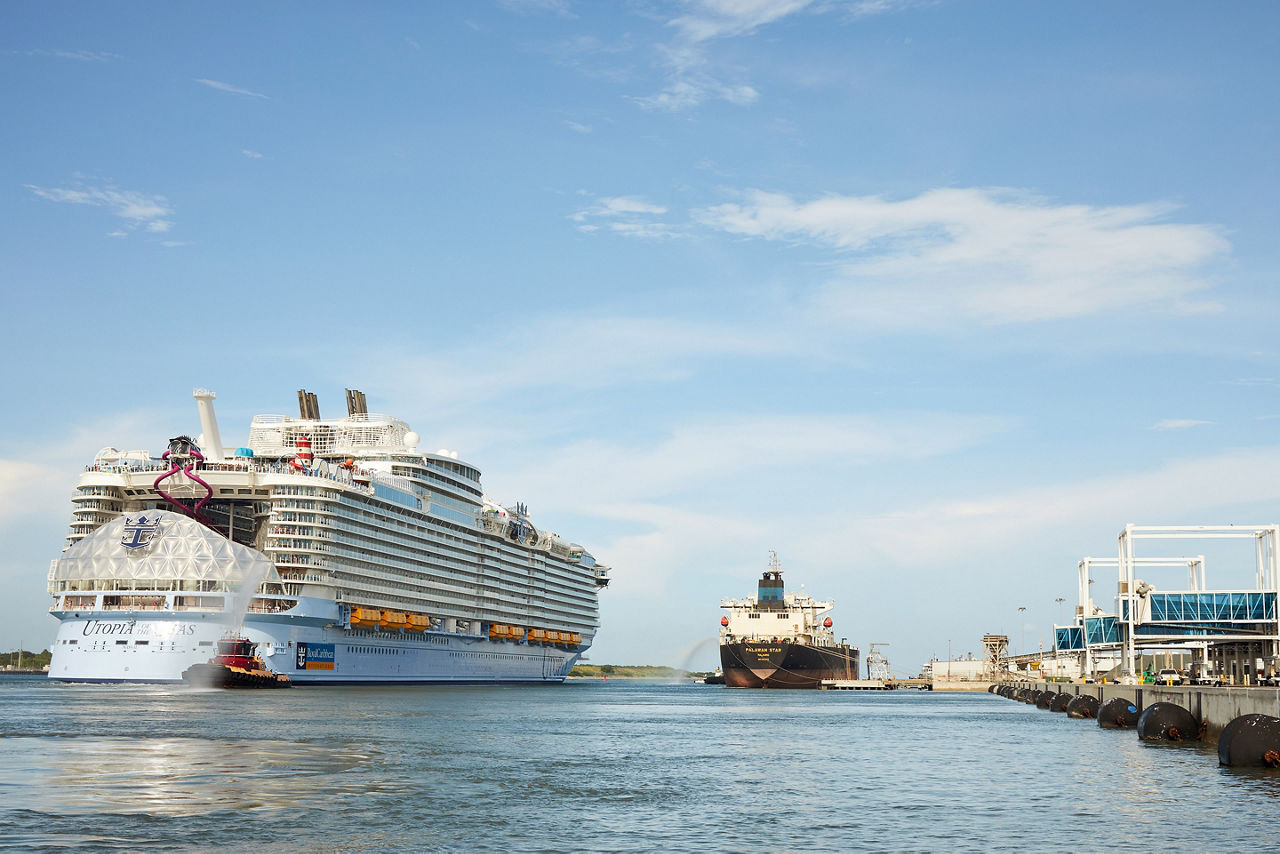 Utopia of the Seas ship leaving Port Canaveral on a summer sunny day.