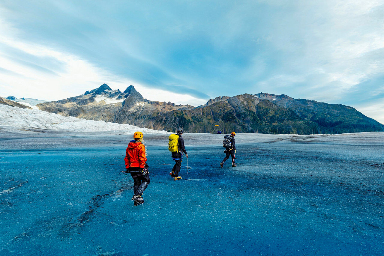 3 Hikers in Juneau Glacier Alaska.