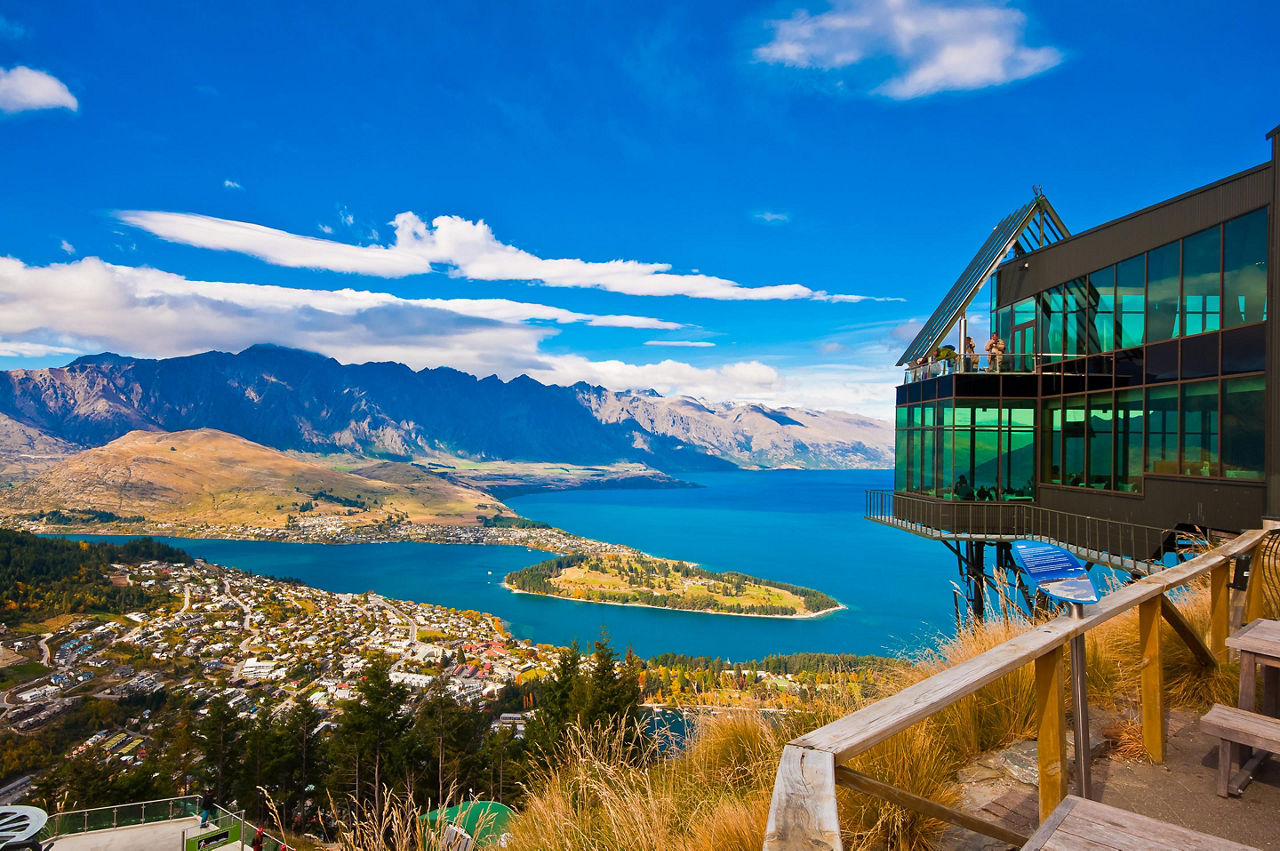 New Zealand Glass Building Over Lake
