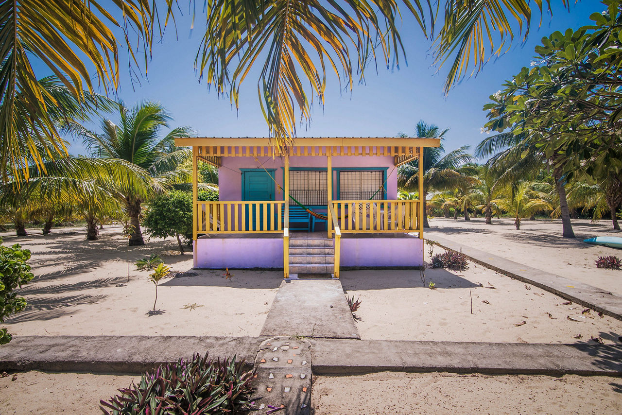 Beach house with Hammock in Placencia, Belize. The Caribbean.