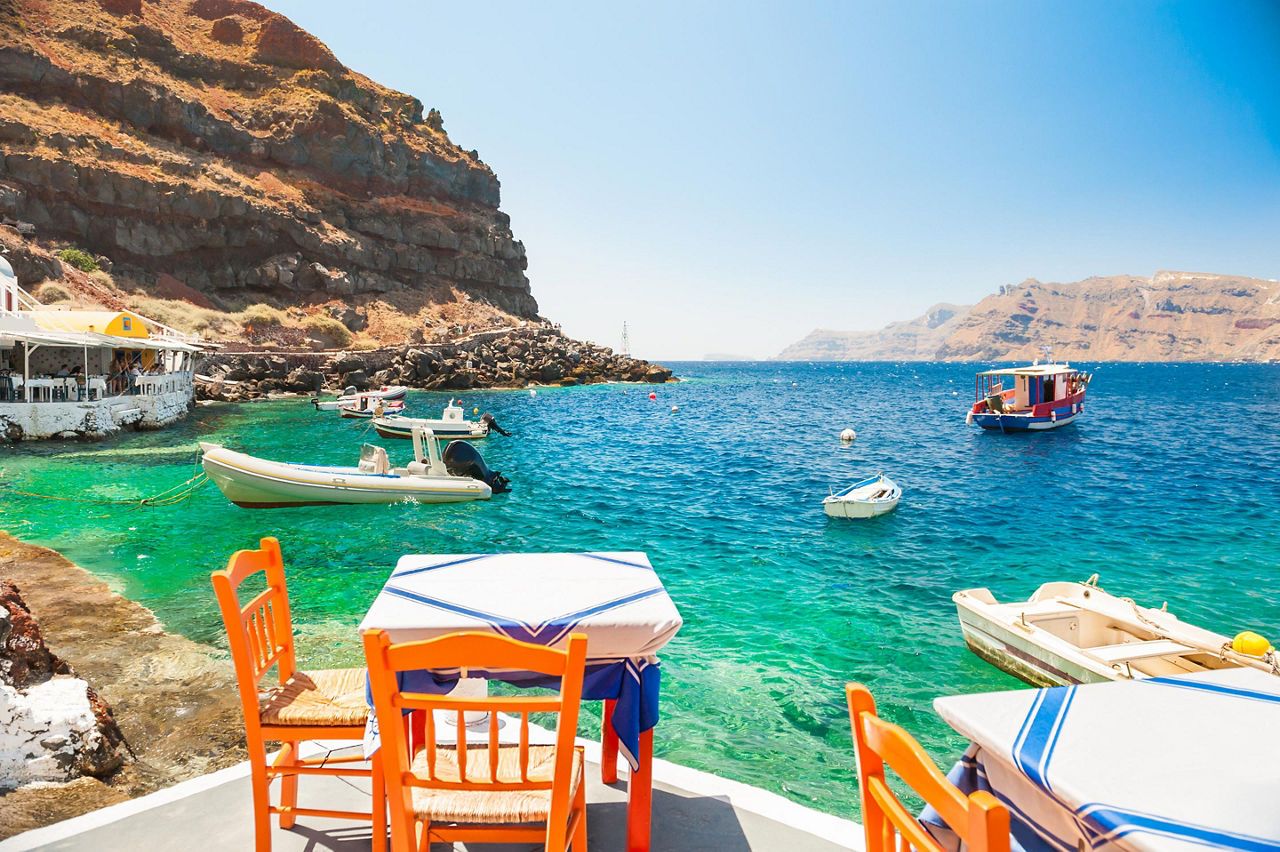 Restaurant  Tables Near Ocean in Santorini, Greece