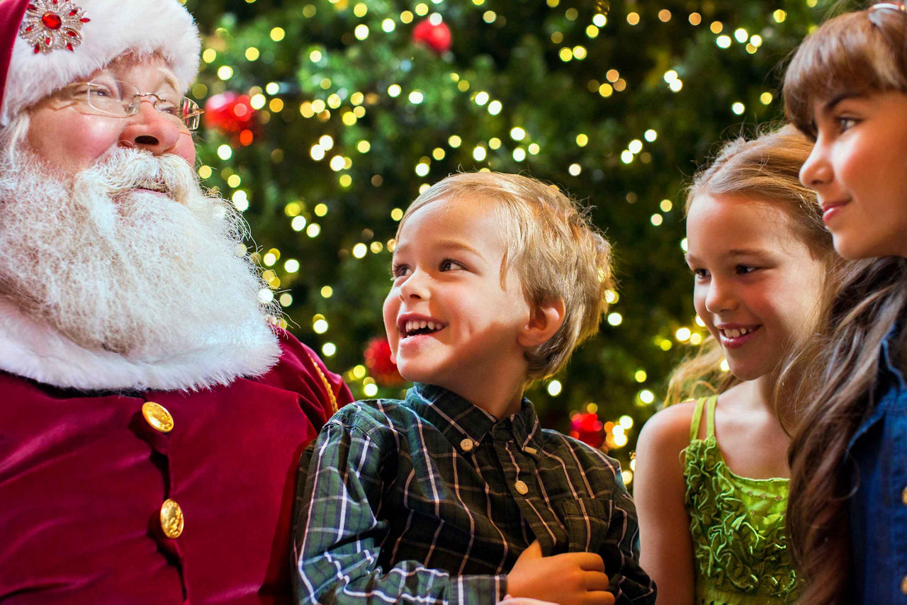 Kids with Santa Claus during December Cruise