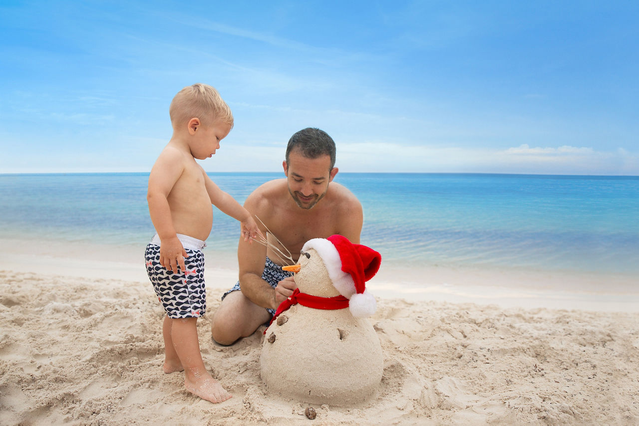 royal caribbean caribbean holiday cruise beach snowman father son sun