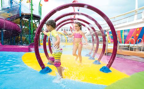 LB, Liberty of the Seas, two kids, children, little boy, girl, playing in Splashaway Bay aqua park, splashing in water, running, fun, smiling,