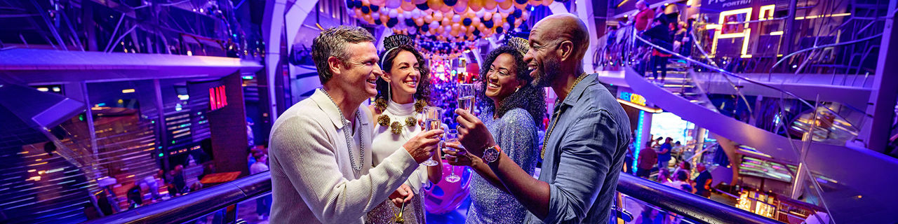 Two couples celebrating New Year's Eve on Rising Tide Bar 