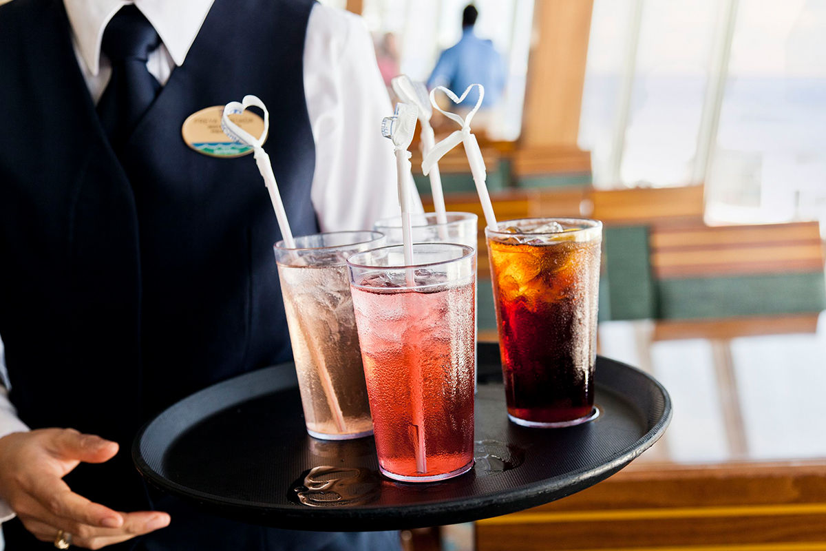 Fountain sodas on serving tray, cruise drink package for kids by Royal Caribbean.
