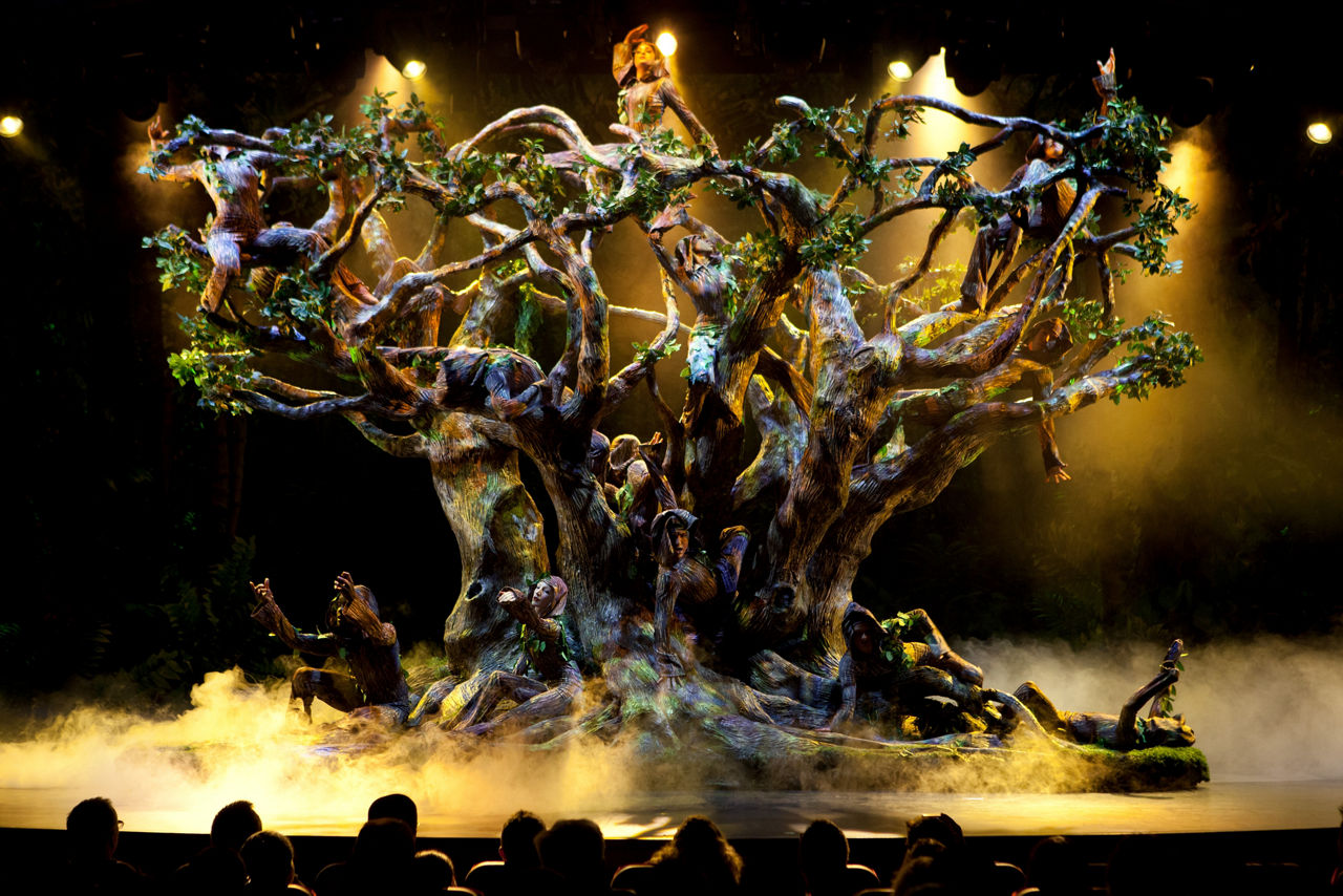 Blue Planet Cruise Show Performers form a tree on stage Allure of the Seas